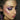 Close up portrait of a woman with soft pastel purple and pink pastel goth eye makeup and pink lips